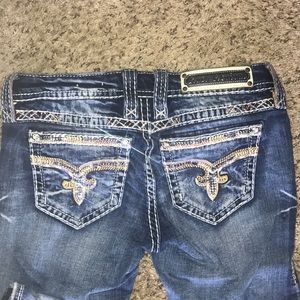 Distressed Rock Revival skinny jeans